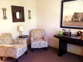 Therapy room with patterned armchairs at the Flourtown office.